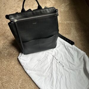 Mina Baie Harper full black leather backpack.